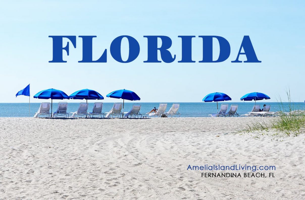 Florida beach, Amelia Island Living magazine, Ritz-Carlton beach umbrellas, Atlantic Ocean.