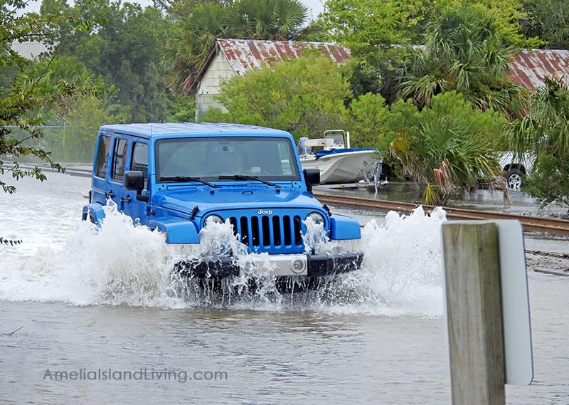 Jeep drives through flooded Front Street, Fernandina Beach. Photo by Amelia Island Living magazine.