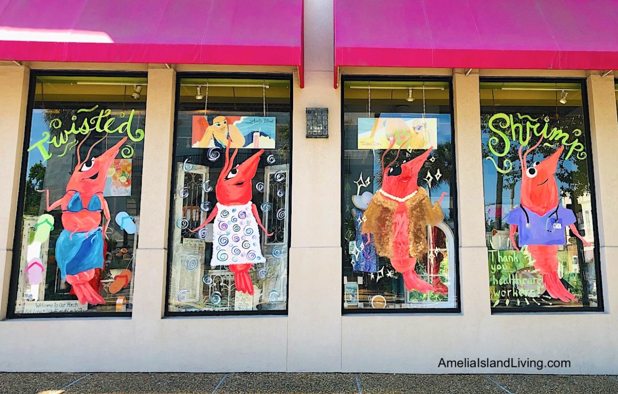 Shrimp-themed store windows at Twisted Sisters on Centre Street. Painted by Fernandina Beach art students in advance of Isle of Eight Flags Shrimp Festival. (Photo by AmeliaIslandLiving.com from archives.)