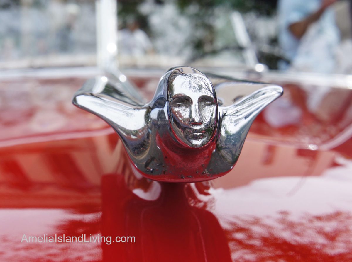 Winged Goddess Hood Ornament On 1942 Cadillac, Amelia Concours d'Elegance. (Photo by AmeliaIslandLiving.com from past event).